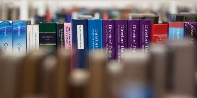A close-up image of books on a shelf