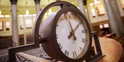 A close up view of a clock in the Brotherton Library reading room