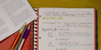 A pad with a reference written out as part of a set of Cornell notes