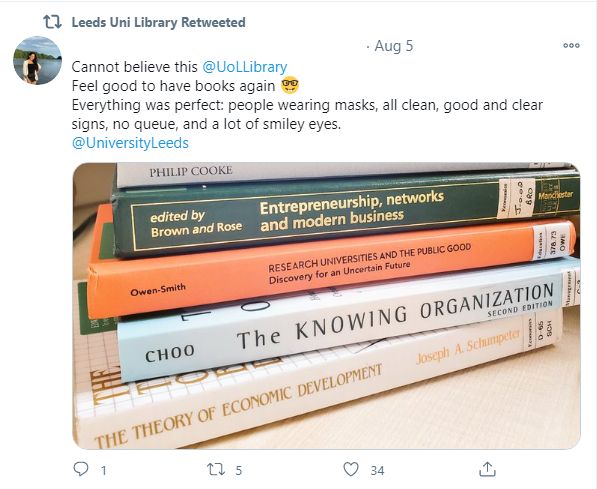 Tweet saying how good it is to have books again and praising covid-safety measures and "smiley eyes"