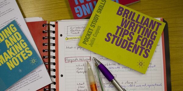 Some student notes with writing help books