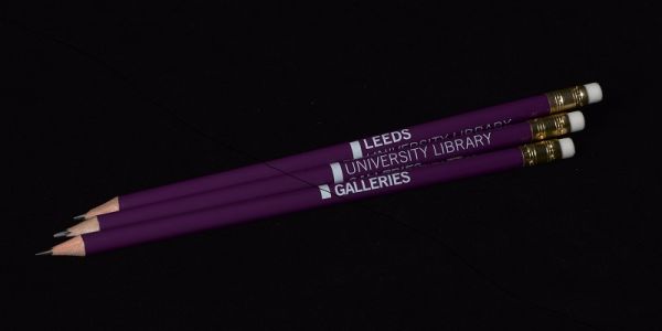 Three purple Galleries pencils