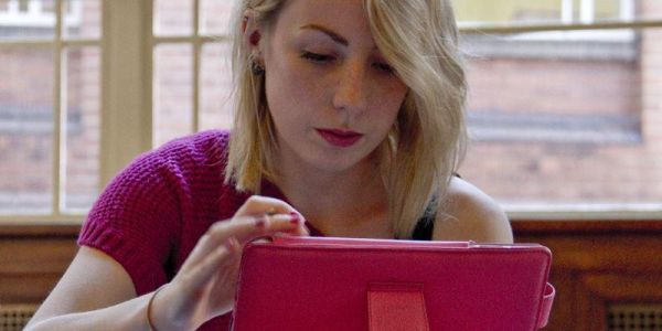 Woman looking at tablet computer