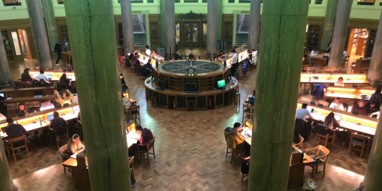 Users studying in the Brotherton enjoying the individual desk lights.