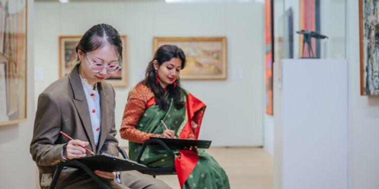 People drawing in The Stanley & Audrey Burton Gallery