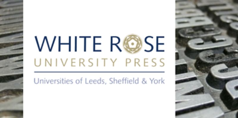 White Rose University Press logo in front of an old printer plate